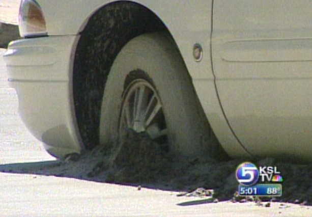 Car Drives into Wet Concrete