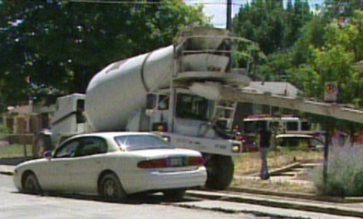 Car Drives into Wet Concrete