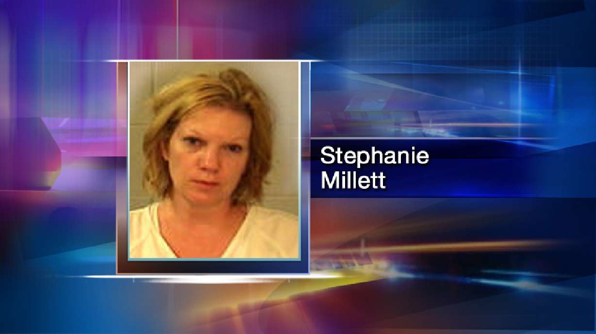 Woman arrested after police say she set fire to her apartment