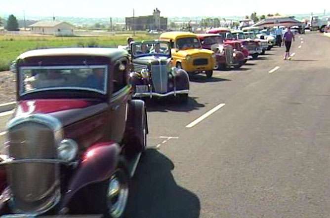 The first traffic on the new road was several dignitaries who rode in classic cars.