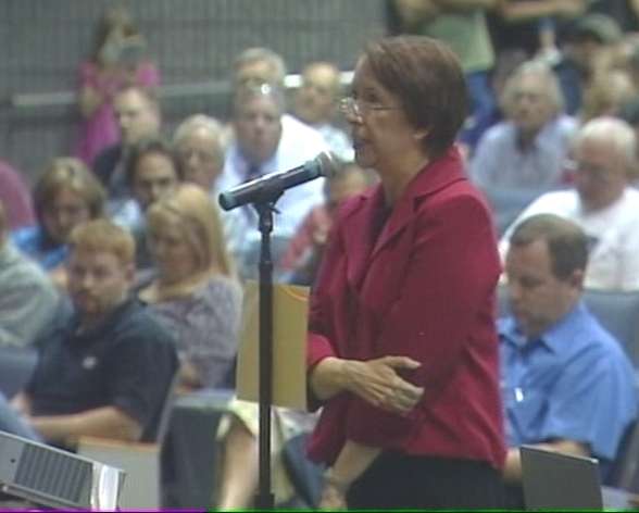 South Jordan resident Carol Brown addresses the board with her concerns.