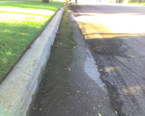 Mysterious liquid in gutter prompts road closure