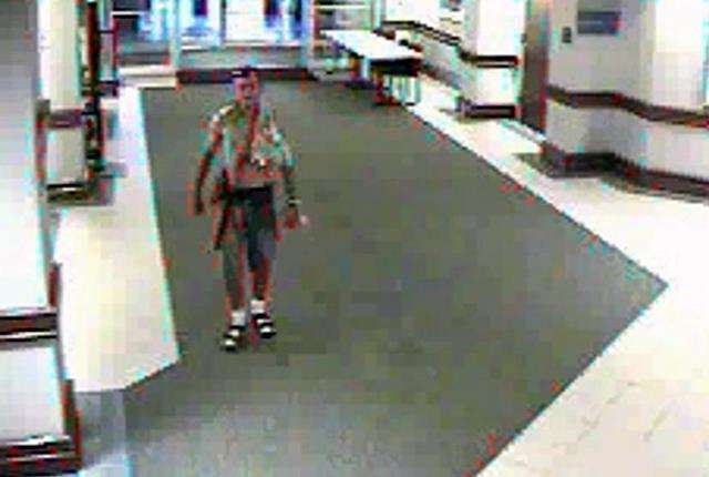 Surveillance picture from August 11 theft at the Granite Education Center in Salt Lake City.