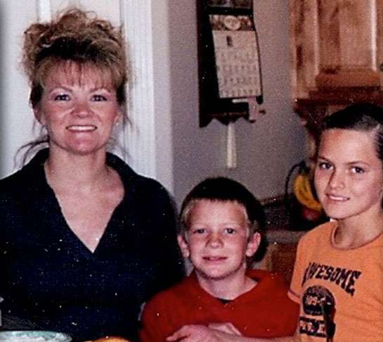Kody Gauer with his mother and sister