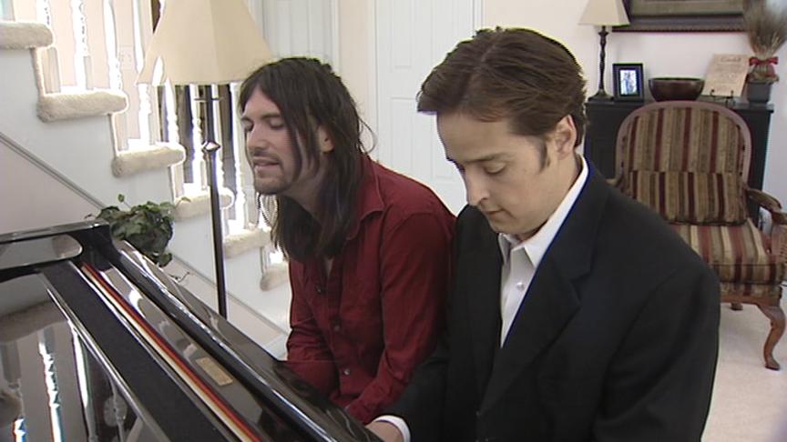 Two Musicians Working Together to Create Christian Music 