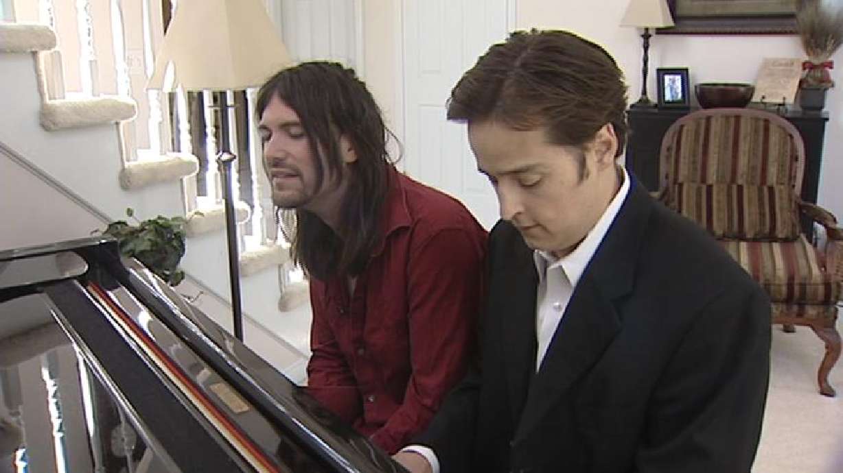 Two Musicians Working Together to Create Christian Music