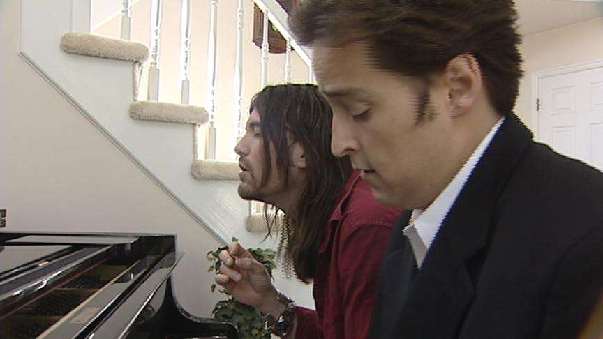 Two Musicians Working Together to Create Christian Music