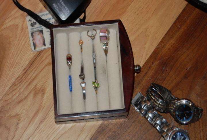 Resident confronts home burglar, helps with arrest