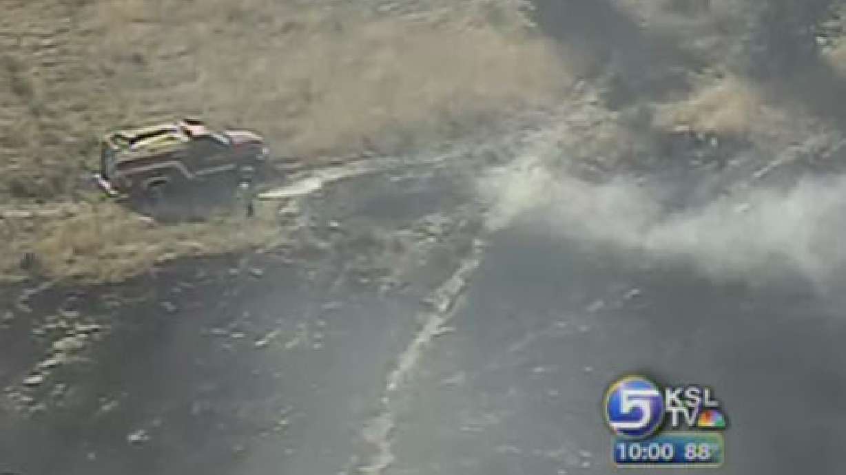 Fire Burns Area Near TRAX Station in Sandy