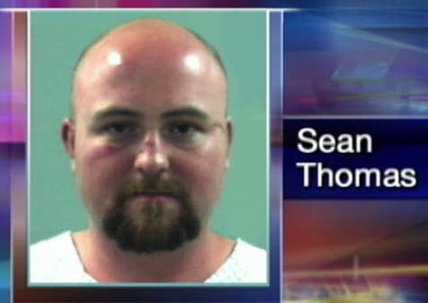 Man arrested after rolling car onto train tracks