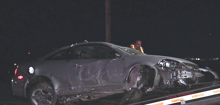 Man arrested after rolling car onto train tracks