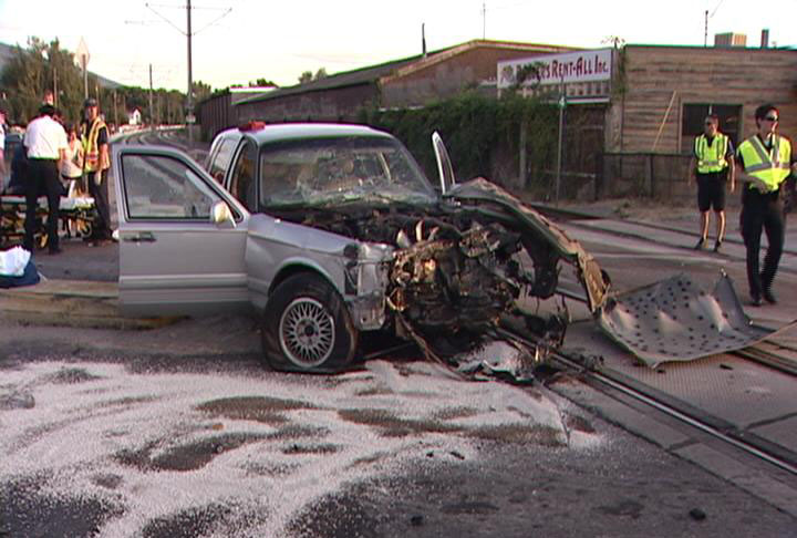 Car hits TRAX train in Midvale