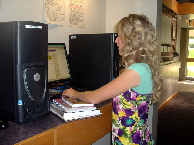 Sharlee Larsen looking up info at Weber State University