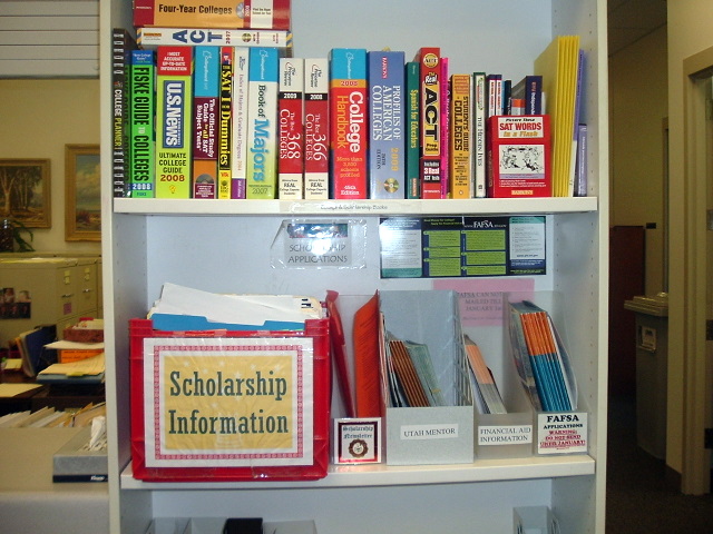 Bookcase of financial aid and scholarship information at East High School