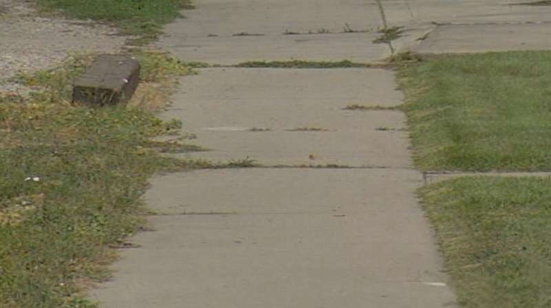 Man accused of robbing and beating 2 men