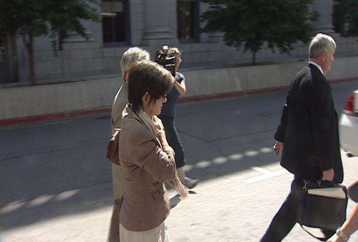 Jeanne Redd walks into court