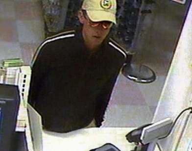 Gardner Westgate seen on surveillance video robbing a West Jordan Albertsons pharmacy on Sept. 11.