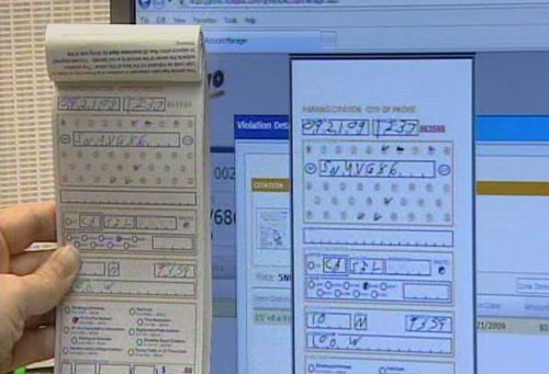 Digital pen documents parking violations; Drivers pay fine online