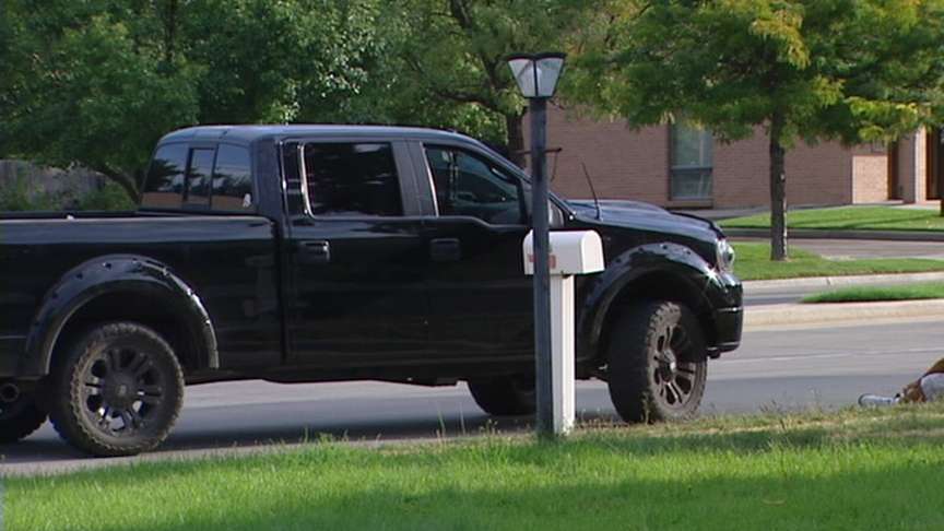 Child riding scooter hit by truck