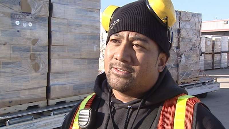 Tasi Toala fought back tears as he began loading the thousands of supplies headed to Samoa. He just learned Monday night that several members of his family had been killed the recent tsunami.