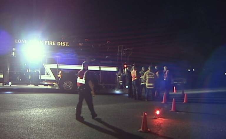 Emergency workers gather outside the Alpine home of the Savage Trucking CEO while Archuleta was allegedly holding him hostage on Sept. 22.
