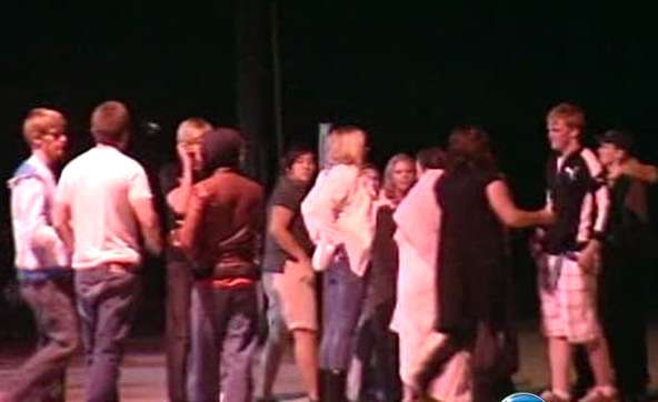 Fellow students gather at American Fork High School Saturday night.