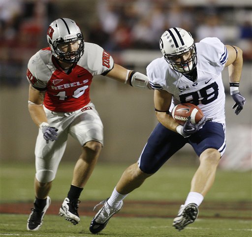 Unga runs for 3 TDs, BYU beats UNLV 59-21
