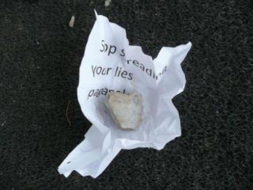 Vandals throw rocks through church windows