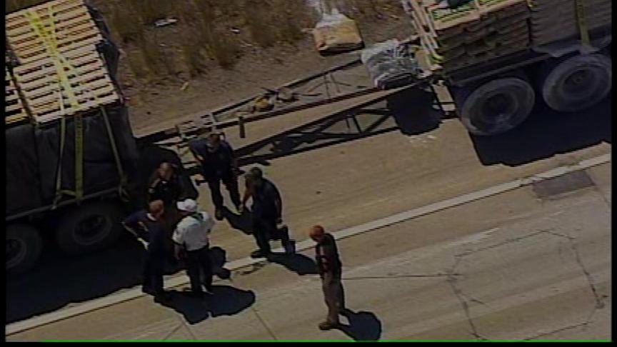 Flatbed Truck Loses Its Load