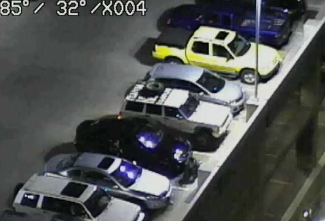Camera's helped police catch a burglary suspect hiding behind a car at Jordan Commons