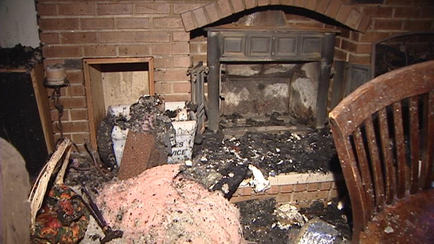 The Layton family's home was nearly destroyed when heat from their wood-burning stove ignited insulation.