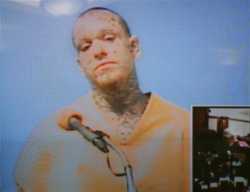 Prisoner Accused of Killing Officer Appears in Court