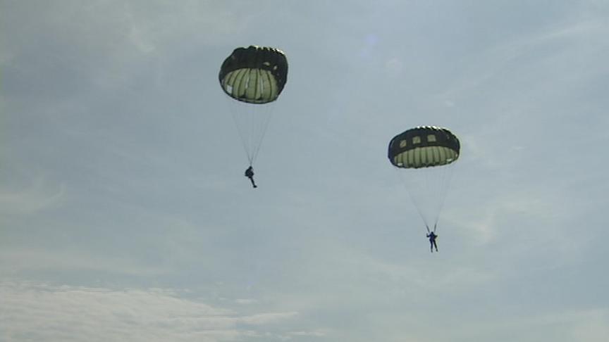 Colonel Passes Military Career to Son in Jump from Plane