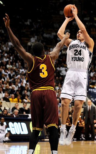 BYU guard Jonathan Tavernari shoots a three-point shot against Arizona State in the second half. (AP Photo/Patrick Smith)