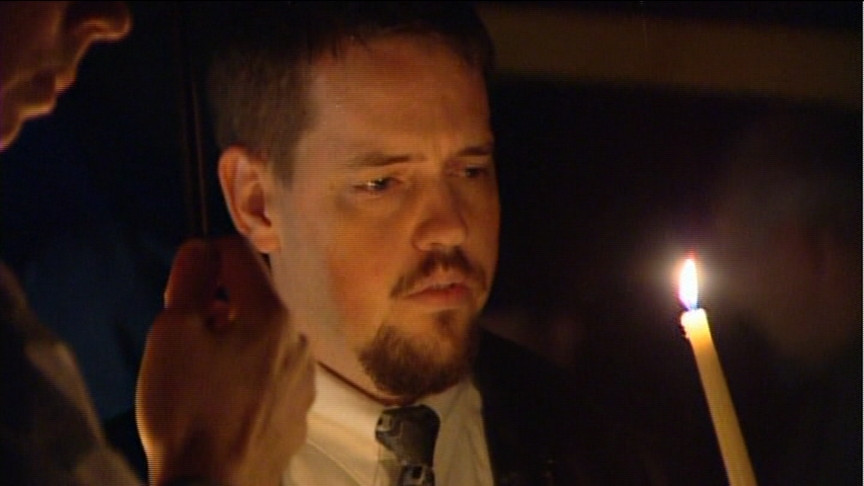 Josh Powell attends a vigil for his missing wife in Washington state on Sunday.