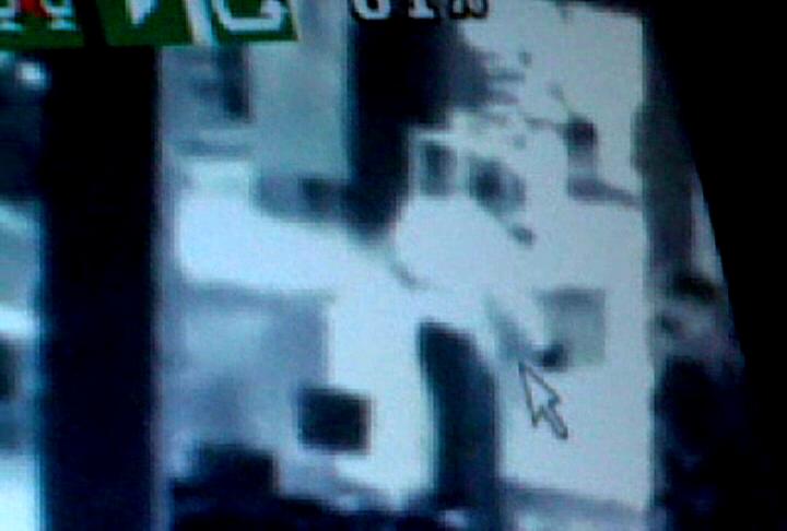 Surveillance video shows the thief fiddling with the kiosk lock before he goes behind the counter and takes the cell phones.