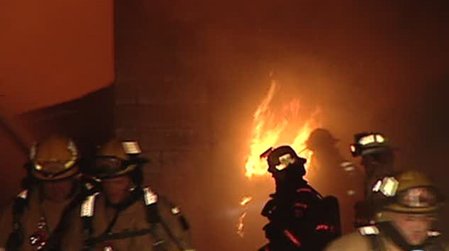 Warehouse fire started by 2 homeless men