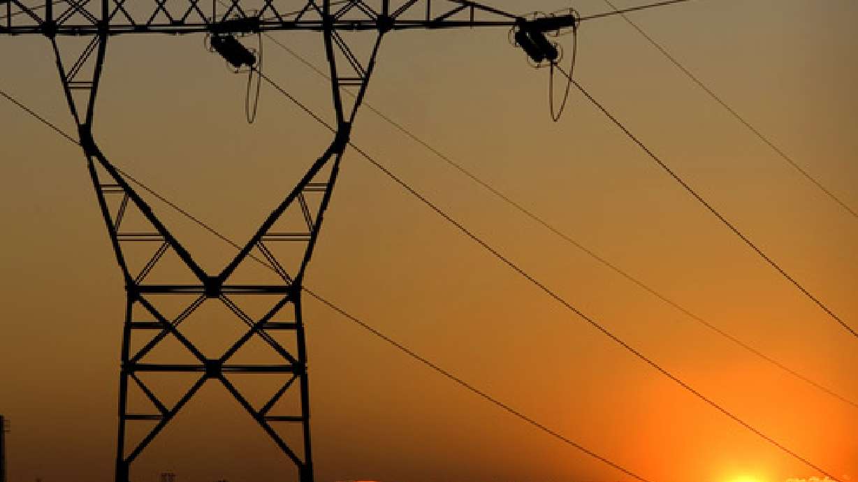 Utility crews work to restore power