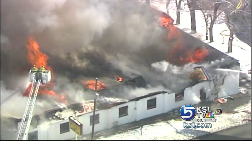 Flames rip through the building Thursday.