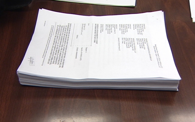 Homer Cutrubus was hit with a 200-page lawusuit from Chrysler, charging him with contempt of court