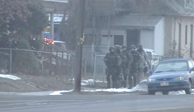 SWAT surrounded a Salt Lake home where they believed suspect Roberto Roman was hiding on Jan. 5.