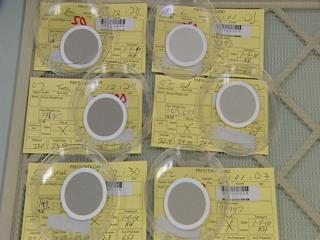 At the state Air Monitoring Center, these filters show just how polluted the air gets on these inversion days. That gray color is 24 hours worth of pollution particulates, not that different from what we breathe.