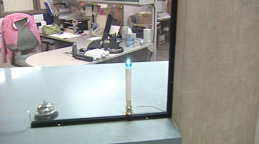 A blue light glows on at the front desk at the Millard County Sheriff's Office in honor of Deputy Josie Fox.