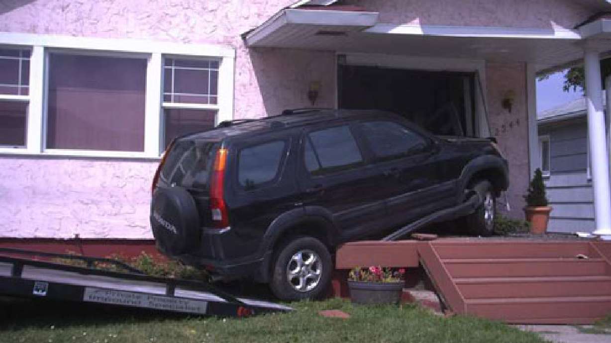 SUV Crashes into a Salt Lake City Home