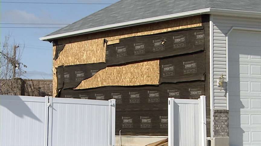 More than three months after the Nov. 4 explosion, many homes near Silver Eagle Refinery are still damaged.