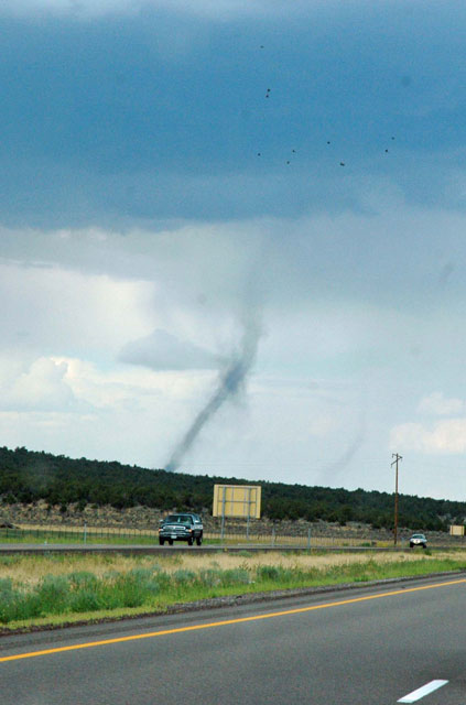 "...taken by my father-in-Law as we were making our way from Cedar
City to Ogden. We were driving up I-15 toward Fillmore... ...we were one mile south of the I-70 interchange to Denver
near Sulfurdale."