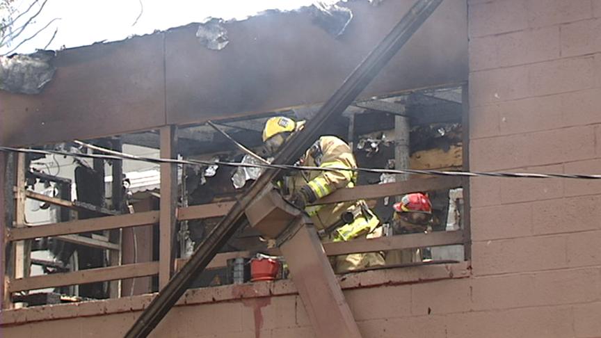 Fire Displaces 13 People 