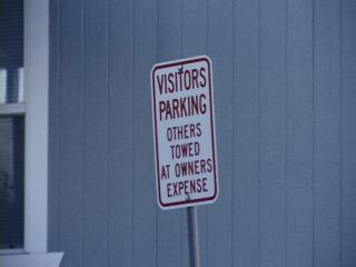 Residents say nearly everyone has had a vehicle belonging to them or one of their guests either booted or towed -- some more than once.