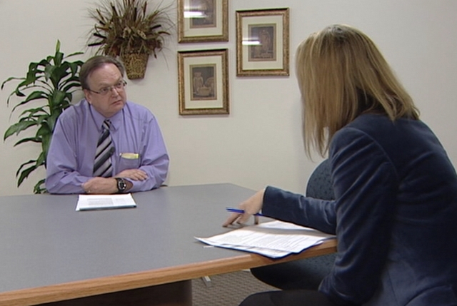 Kerry Bate, director of the Housing Authority of the County of Salt Lake, talks with KSL's Lori Prichard