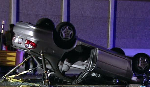 Car rolls over on Bangerter Highway